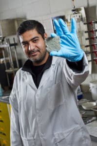 Hamed-Behzadipour-holding-a-sample-of-biocemented-tailings